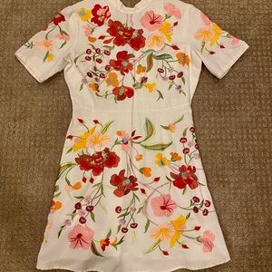 Cute spring and summer floral mock neck dress!